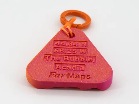 Real photo: a customer’s Ember keychain of The Bubble, Acadia, back side