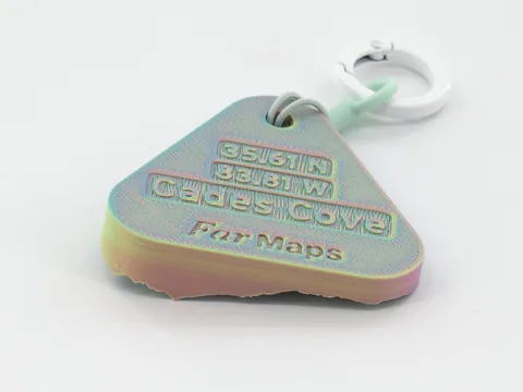 Real photo: a customer’s Sorbet keychain of Cades Cove, back side