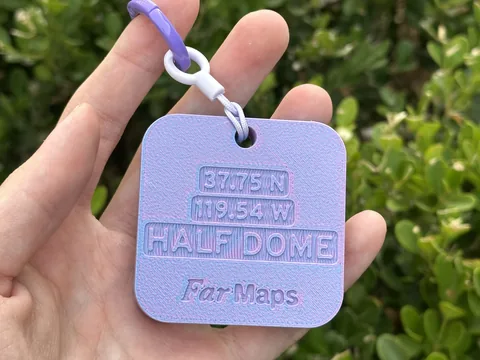 Real photo: Dawn keychain of Half Dome, back side