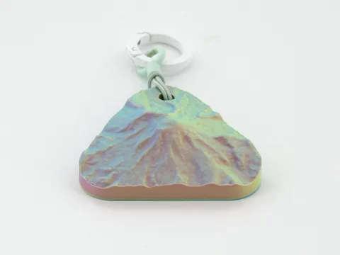 Real photo: Sorbet keychain of Mount Rainier National Park, the same piece seen from four sides